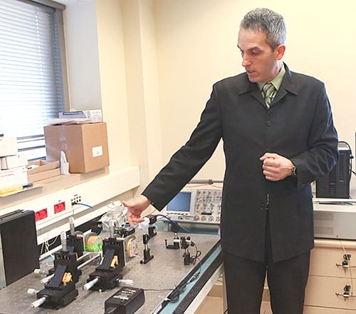 Amos Danielli in his lab