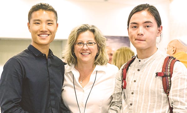 At the Luncheon Meeting with International Students from China, event moderator Dr. Danielle Gurevitch, Chair of the Sir Naim Dangoor Center for Universal Monotheism, poses with foreign students