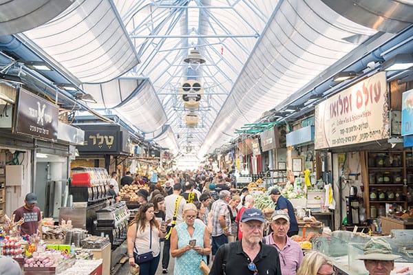 Ethnic food tasting in the colorful Machane Yehuda market